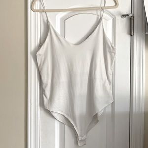 White, thin strap body suit! It is Gaze brand, size large! Only worn once.